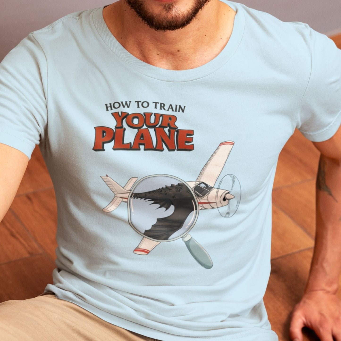 HOW TO TRAIN YOUR PLANE regular tee | THE PARODY HANGAR